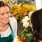 Fleuriste qui sert une cliente David's Hof